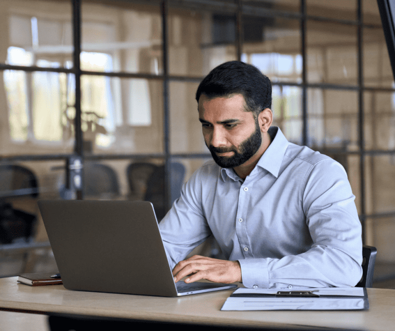 Man-with-computer-768x644